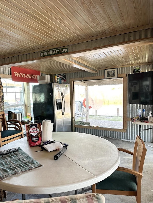 dining space with wooden ceiling