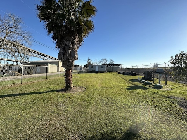 view of yard with fence