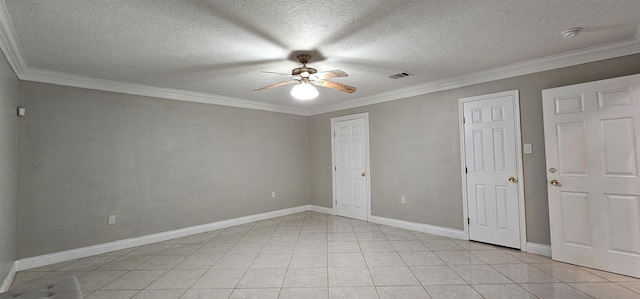 tiled spare room with a textured ceiling, ceiling fan, and crown molding