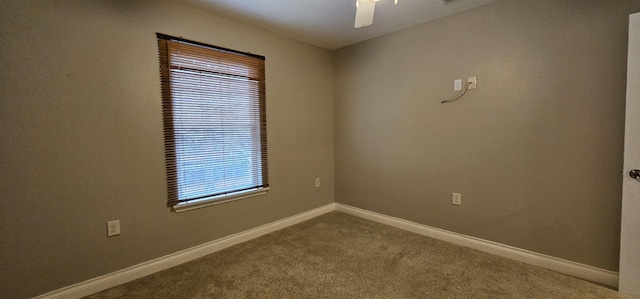 unfurnished room featuring carpet flooring and ceiling fan