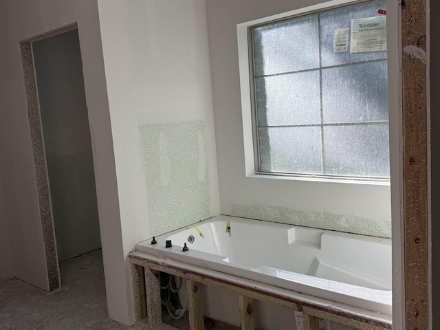 bathroom featuring a tub