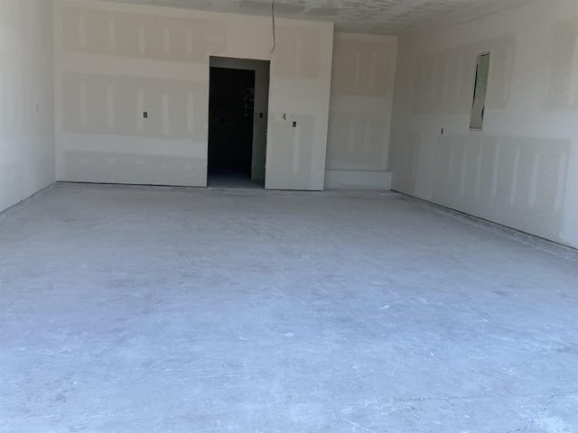 spare room featuring concrete floors