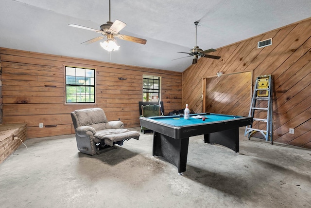 400 French Rd, Lumberton, TX 77657 - recreation room with a ceiling fan, healthy amount of natural light, concrete flooring, and wood walls