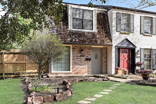 view of front of home with a front yard