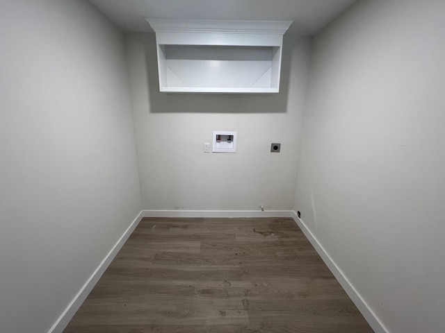 laundry area featuring laundry area, baseboards, dark wood-type flooring, hookup for a washing machine, and hookup for an electric dryer