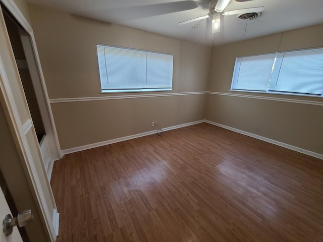 interior space featuring hardwood / wood-style floors, a closet, and ceiling fan