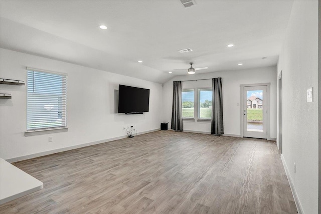 unfurnished living room featuring light wood-style floors, recessed lighting, baseboards, and a ceiling fan