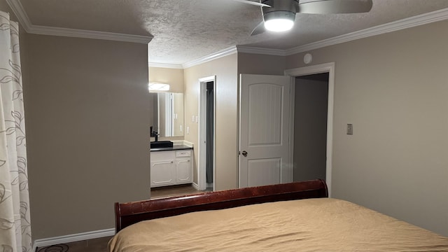 bedroom with connected bathroom, ceiling fan, crown molding, and a textured ceiling