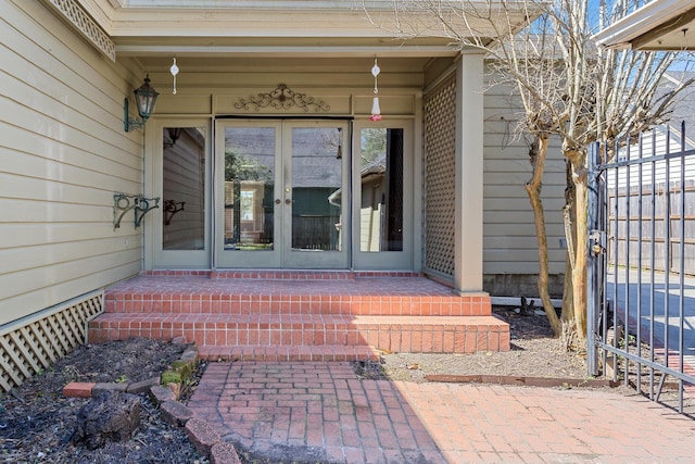 entrance to property featuring french doors