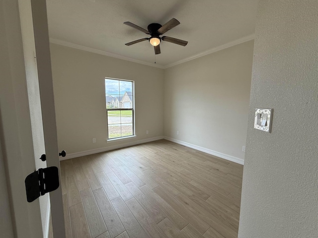 7735 Windcastle Dr, Beaumont, TX 77713 - spare room with wood finished floors, a ceiling fan, and ornamental molding