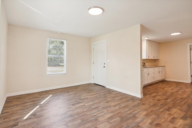 empty room featuring hardwood / wood-style floors