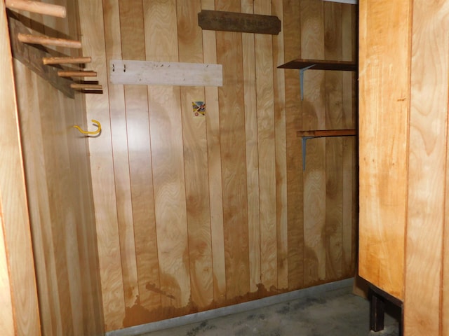 6340 Capitol St, Groves, TX 77619 - detailed view of concrete flooring and wooden walls