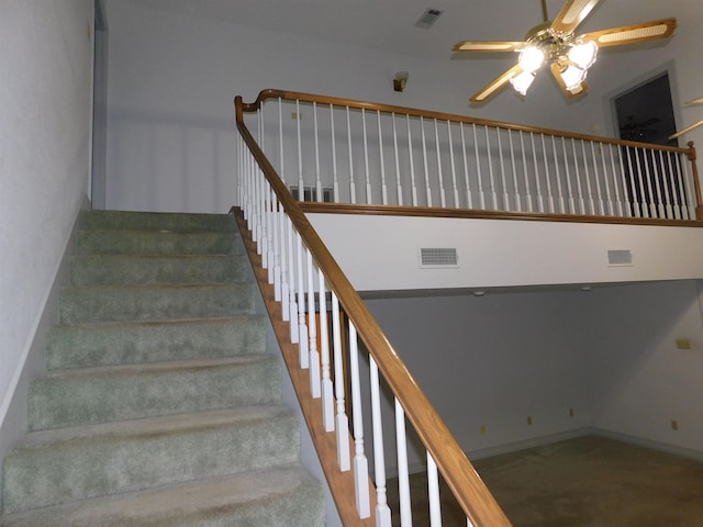 6340 Capitol St, Groves, TX 77619 - staircase featuring ceiling fan