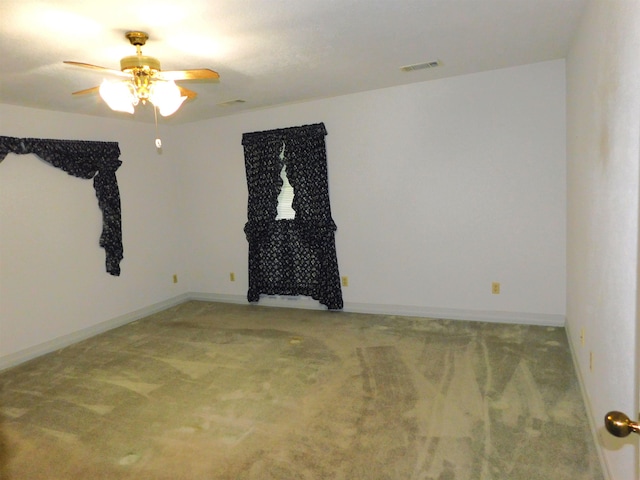 6340 Capitol St, Groves, TX 77619 - empty room featuring carpet and a ceiling fan