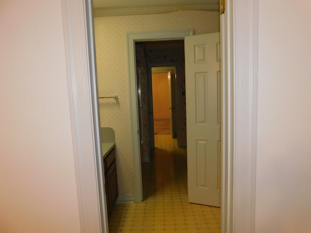 6340 Capitol St, Groves, TX 77619 - hallway featuring wallpapered walls and light flooring