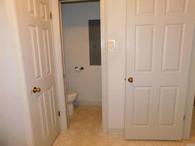 6340 Capitol St, Groves, TX 77619 - bathroom featuring electric panel and toilet