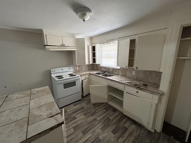 kitchen featuring tile counters, sink, dark hardwood / wood-style flooring, white range with electric stovetop, and white cabinets