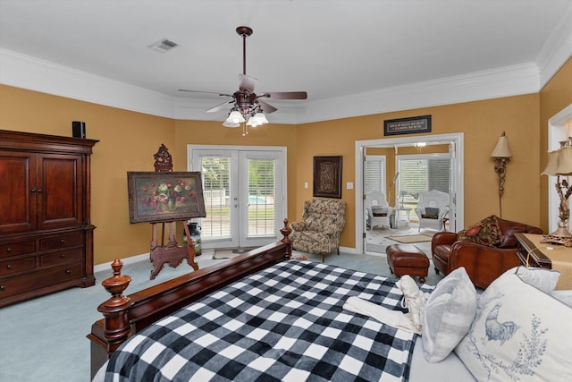 carpeted bedroom with french doors, access to outside, ceiling fan, crown molding, and multiple windows