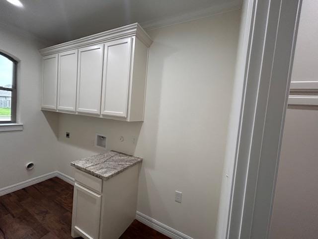 washroom with electric dryer hookup, baseboards, hookup for a washing machine, and cabinet space