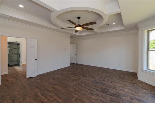 empty room with dark wood finished floors, a ceiling fan, baseboards, and coffered ceiling