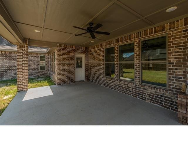 view of patio / terrace featuring ceiling fan