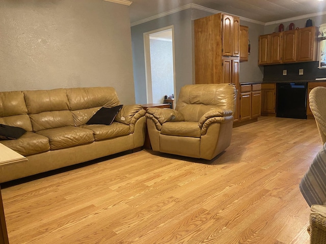  - living area with ornamental molding and light wood finished floors