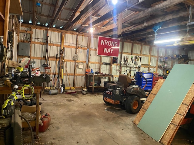  - garage with a workshop area and electric panel
