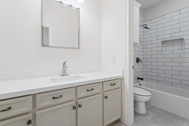 8010 Village Dr, Beaumont, TX 77713 - full bath with vanity, toilet, and shower / washtub combination