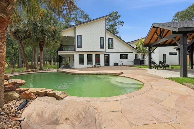102 Timbercreek Dr, Lumberton, TX 77657 - swimming pool featuring a patio and a gazebo