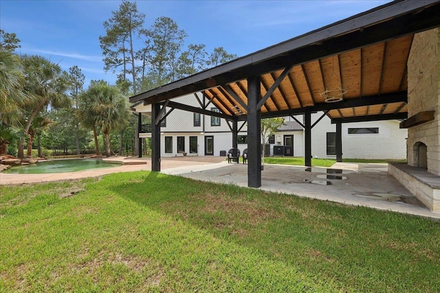102 Timbercreek Dr, Lumberton, TX 77657 - view of property's community featuring a patio, a swimming pool, and a yard