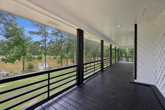102 Timbercreek Dr, Lumberton, TX 77657 - wooden deck with a water view and view of wooded area