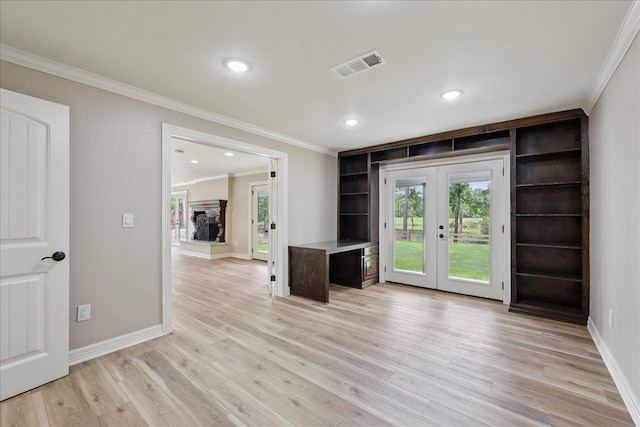 102 Timbercreek Dr, Lumberton, TX 77657 - unfurnished living room with french doors, crown molding, light wood-type flooring, and recessed lighting