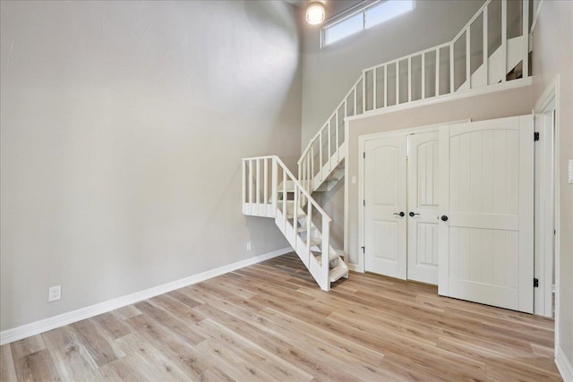 102 Timbercreek Dr, Lumberton, TX 77657 - staircase with wood finished floors and a high ceiling