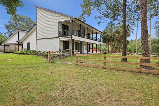 102 Timbercreek Dr, Lumberton, TX 77657 - rear view of house with a balcony and brick siding