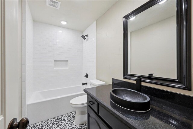 102 Timbercreek Dr, Lumberton, TX 77657 - bathroom featuring vanity, shower / bath combination, and tile patterned flooring