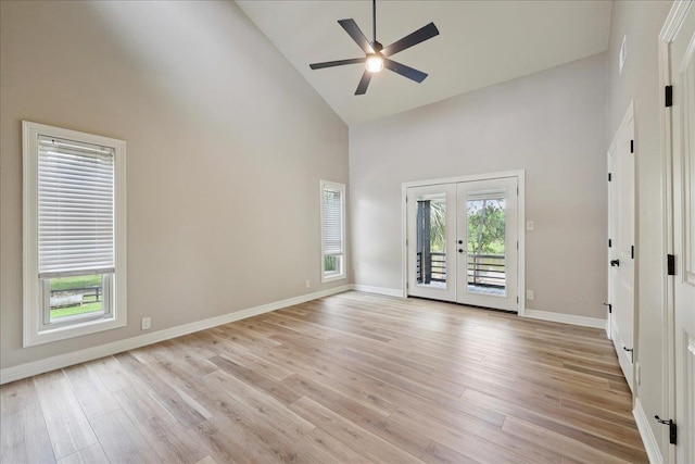 102 Timbercreek Dr, Lumberton, TX 77657 - empty room featuring high vaulted ceiling, a ceiling fan, light wood-type flooring, and french doors