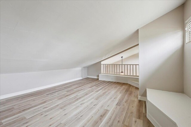 102 Timbercreek Dr, Lumberton, TX 77657 - additional living space featuring vaulted ceiling and light wood-type flooring