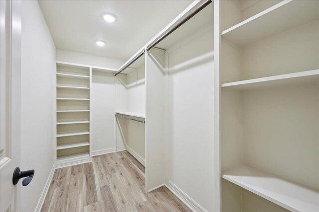 102 Timbercreek Dr, Lumberton, TX 77657 - spacious closet with light wood-style flooring