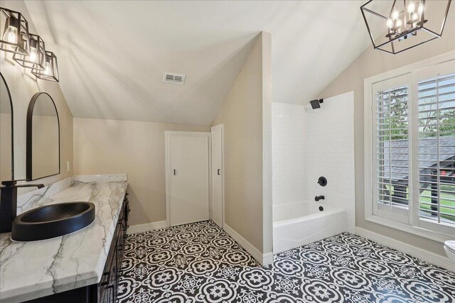 102 Timbercreek Dr, Lumberton, TX 77657 - full bath with lofted ceiling, vanity, plenty of natural light, bathing tub / shower combination, and a chandelier