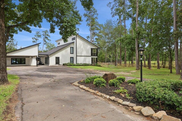 102 Timbercreek Dr, Lumberton, TX 77657 - view of front of property with driveway and a carport