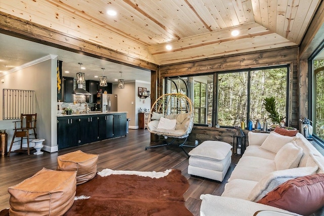 living area featuring dark wood-style flooring, wood ceiling, crown molding, and lofted ceiling