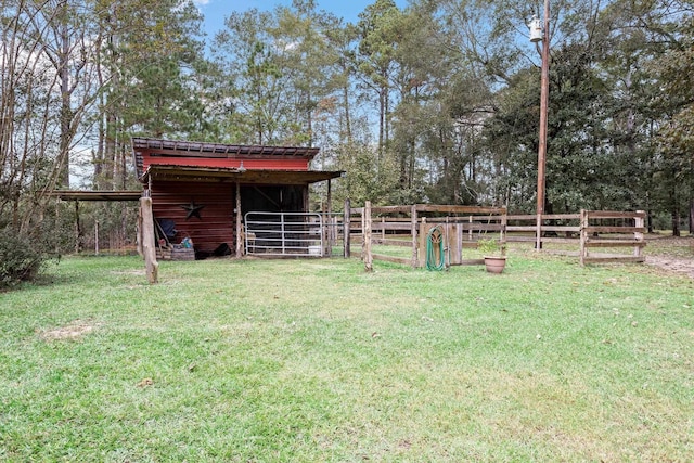 6531 Childress Ln, Kountze, TX 77625 - view of yard with an outbuilding and an exterior structure