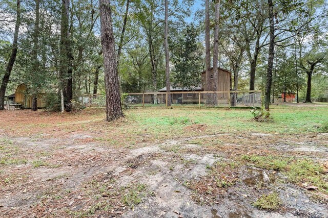 6531 Childress Ln, Kountze, TX 77625 - view of yard with a barn