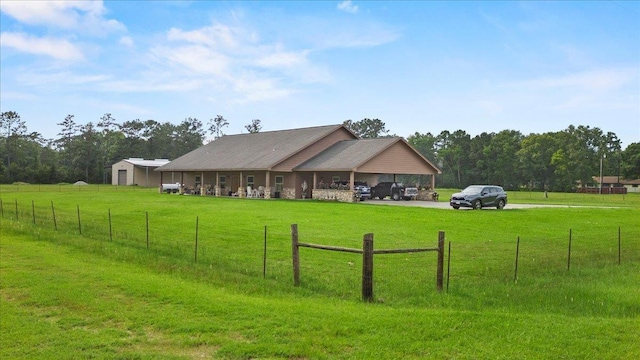 view of yard with a rural view