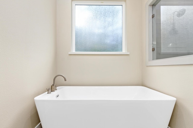 6795 Palace Dr, Lumberton, TX 77657 - full bathroom with a freestanding bath and a wealth of natural light