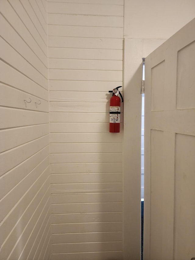 interior details featuring wooden walls