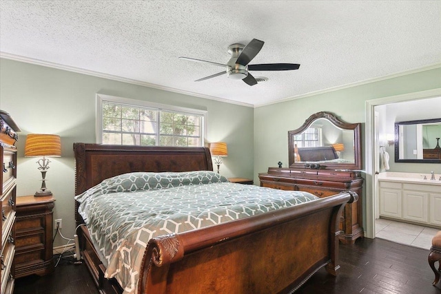 bedroom featuring connected bathroom, ceiling fan, and ornamental molding