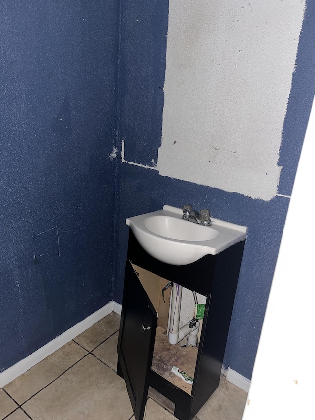 bathroom featuring tile patterned floors and sink