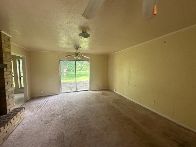 5935 Falcon Ln, Beaumont, TX 77708 - empty room featuring a ceiling fan, carpet flooring, a textured ceiling, baseboards, and ornamental molding