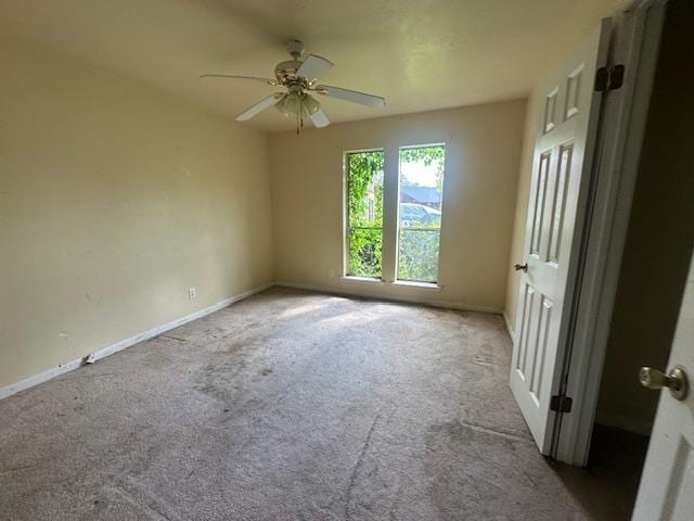 5935 Falcon Ln, Beaumont, TX 77708 - carpeted empty room featuring a ceiling fan and baseboards